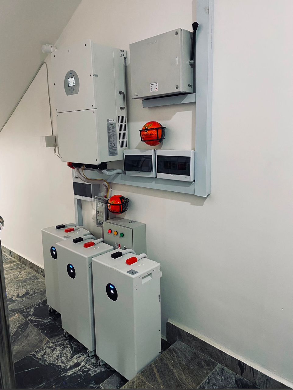 Deye hybrid inverter and three lithium batteries installed in a Nigerian home by Solar World Electric