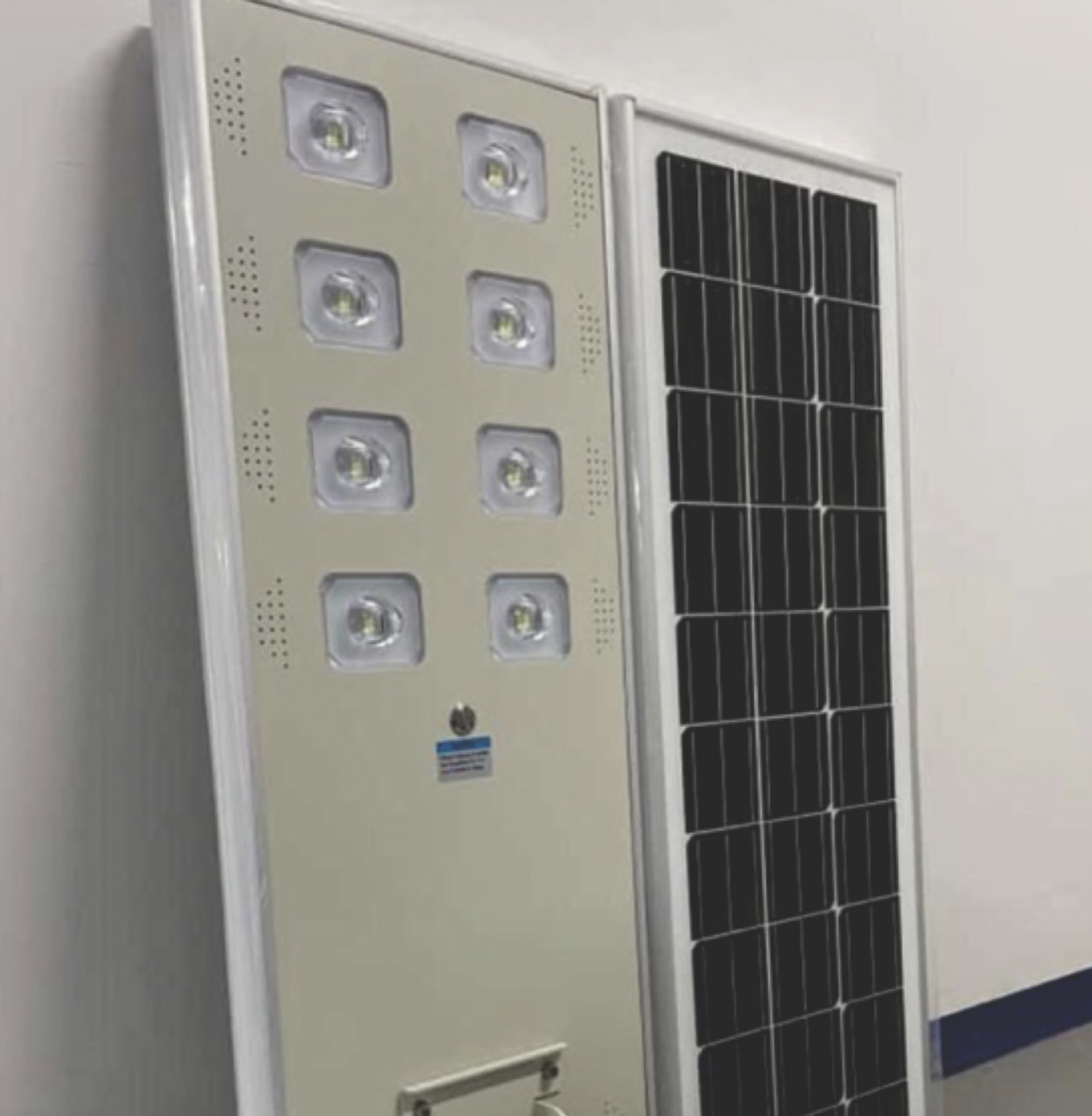 All-in-one solar street light with integrated panel, lithium battery and LED head